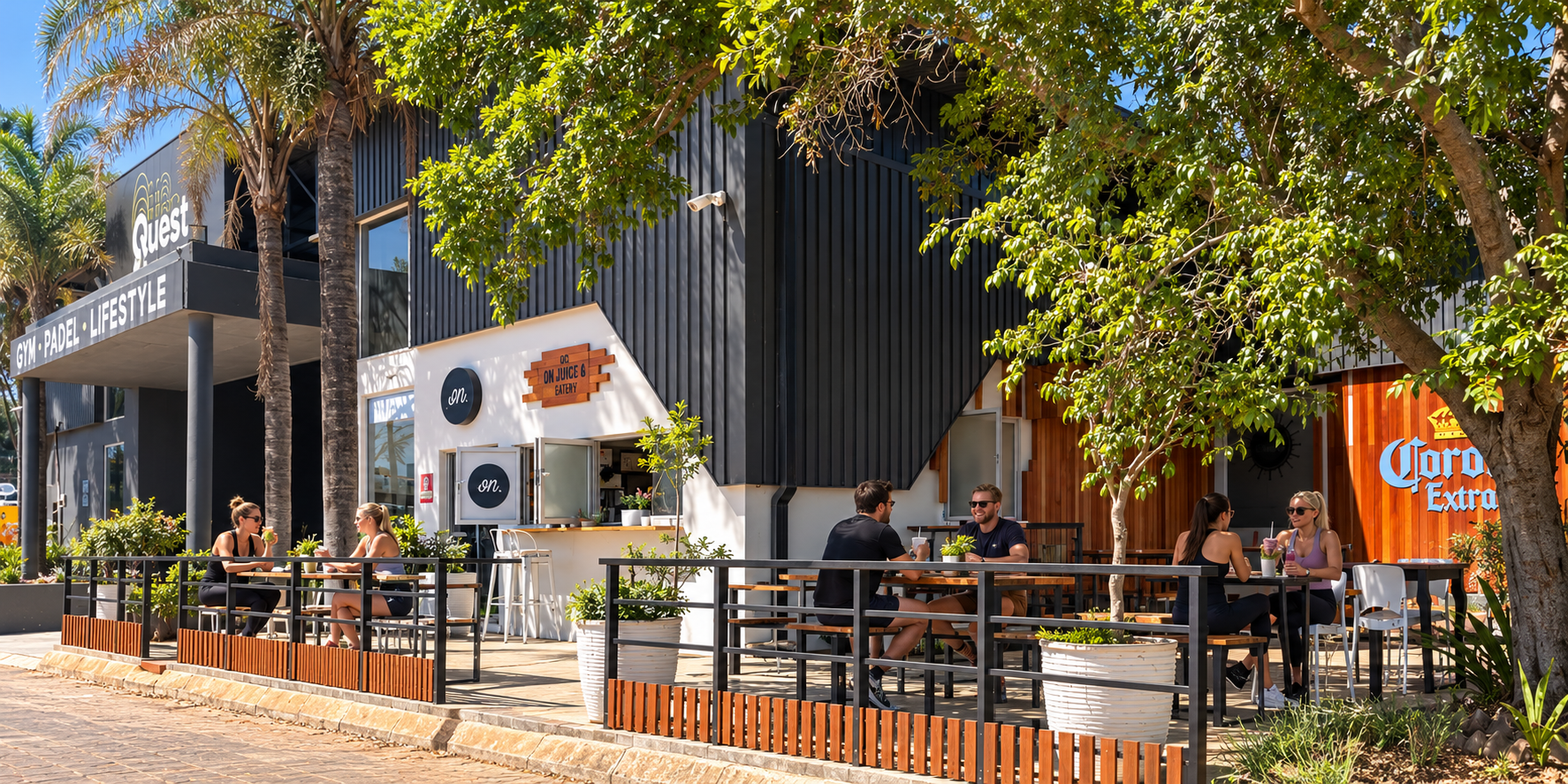 Quest Gym ON café terrace, edited to illustrate customers using the outdoor seating
